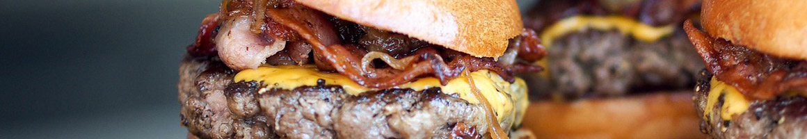 Eating American (New) American (Traditional) Burger at Hamburger Mike's restaurant in Stockbridge, GA.